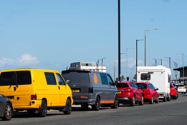 Campers and motorhomes parked up on Morecambe Prom near Aldi.