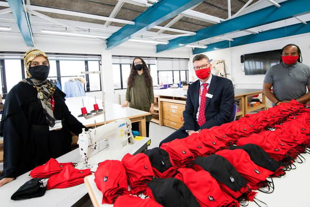 Some of the face coverings being made to allow a safe return to the university’s campuses - from l-r Femida Adam, face coverings project Leader; Zuleikha Chikh, UCLan Students’ Union president; Professor Graham Baldwin, UCLan Vice-Chancellor; and David Knight, senior lecturer in the School of Arts and Media.