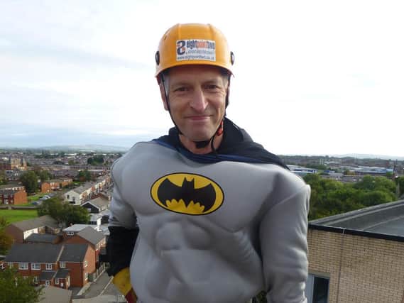 Stephen Greenhalgh,who is retiring this week as Chief Executive of St Catherine's Hospice, pictured doing a sponsored abseil in aid of the charity.
