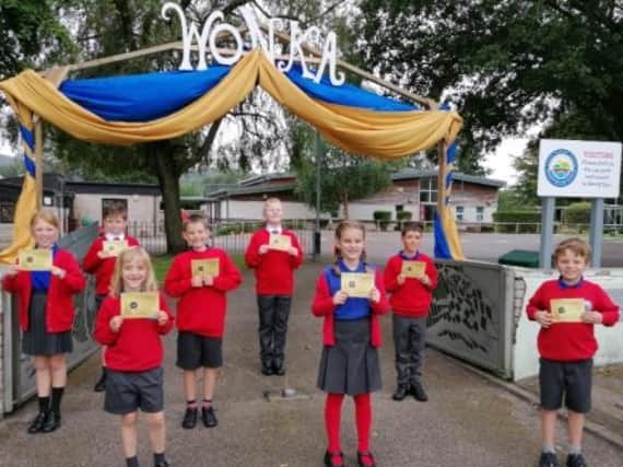 Caton Primary School pupils with their golden tickets during their Charlie and the Chocolate Factory themed week.