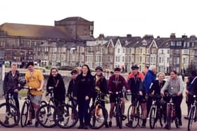 Team Reece cycle ride along Morecambe promenade. Pictured in the middle is Rachel O'Neil,  Reece Holt's mum,  with the schoolchildren who took part in the cycle ride.