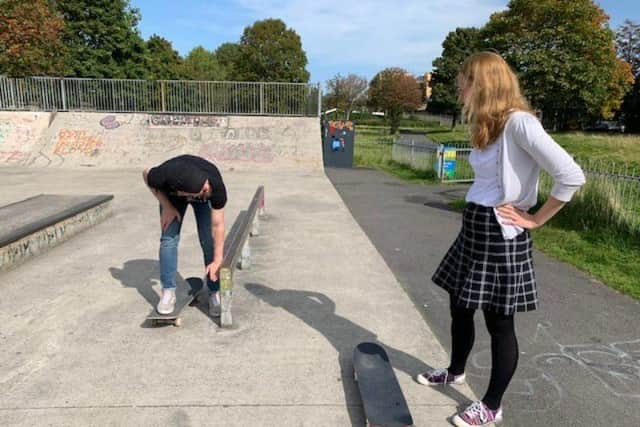 Cat Smith with Adam at the skatepark.
