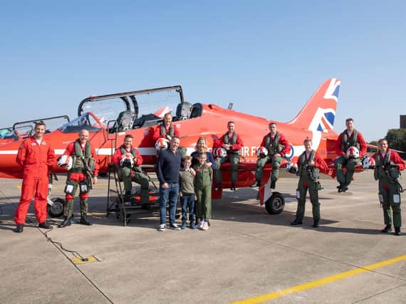 John Stephenson and family with the RAF crew he met as part of his Make-A-Wish treat.