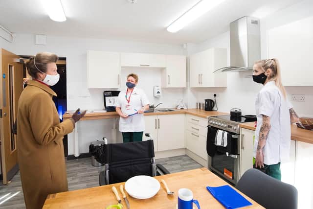 Princess Anne was treated to a kitchen assessment demo  by UCLan students Rachel Lindsay and Clara Harvey-Hunt
