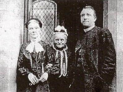 Margaret Coulston, centre, who donated land and money to build St Joseph's Church. Also pictured are Mrs Smith and Fr Thomas Murphy.