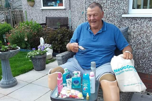 Service user Les with his wellbeing pack.