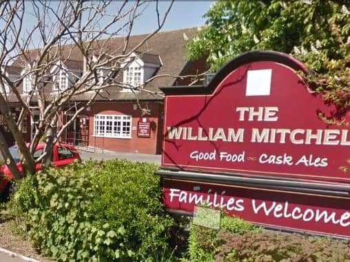 A member of staff and a customer at The William Mitchell pub have tested positive for Covid-19.