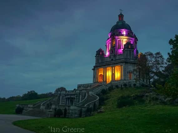 Lancaster’s Ashton Memorial lit up in purple and yellow on October 18 to celebrate Developmental Language Disorder Awareness Day. Photo by Ian Greene