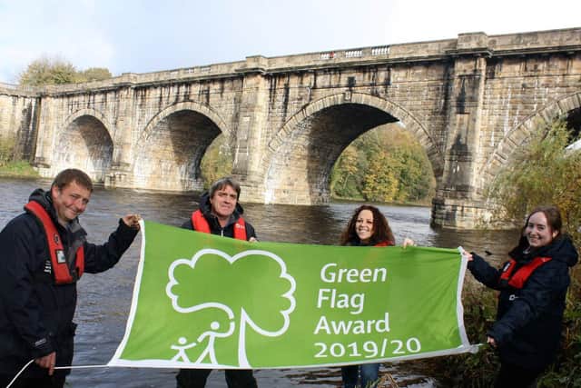 The Lancaster Canal & River Trust team which led on the Lancaster Canal Green Flag application by the Lune Aqueduct: from left: Ben Armytage, Antony Bush, Angela Parkinson Green and Anna Barlow.