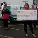 Staff from the Soul Bowl in Morecambe with their cheque for Morecambe Bay Foodbank.