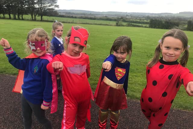 Schoolchildren from Archbishop Hutton’s VC Primary School in Warton dressed up as superheroes and did a sponsored run to raise money for new IT equipment for the school.