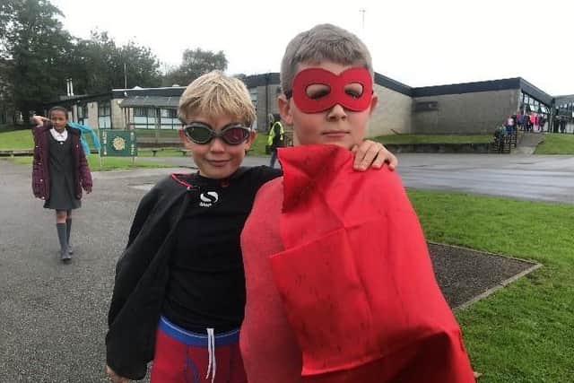 Schoolchildren from Archbishop Hutton’s VC Primary School in Warton dressed up as superheroes and did a sponsored run to raise money for new IT equipment for the school.