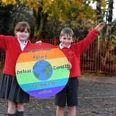 Youngsters at Longridge CE Primary have designed an eye-catching Covid-19 safety logo