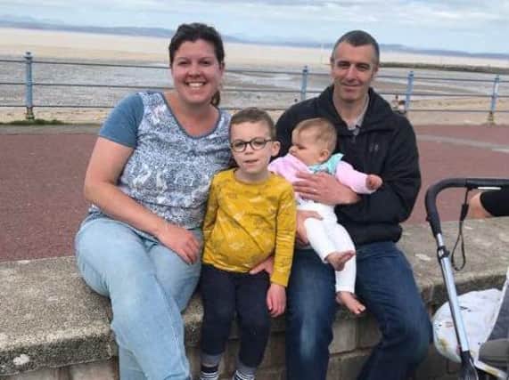 Louise Phillips who now works for the NHS as a secretary at Westmorland General Hospital is pictured with her husband, Pat, son Bradley and baby daughter, Molly.