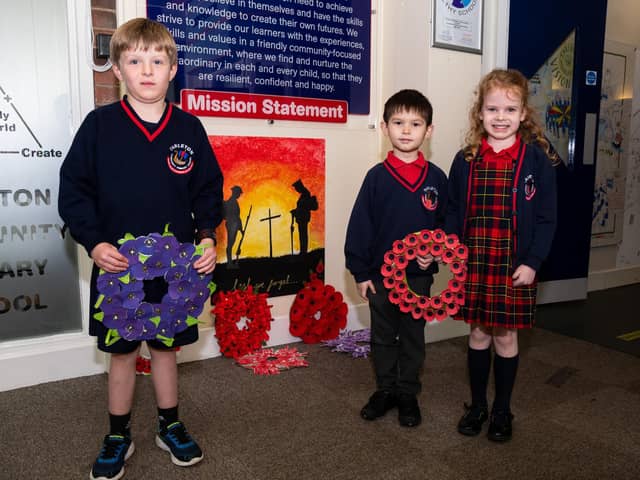 Pupils from Tarleton Community Primary School with their hand-made wreaths. Photo: Kelvin Stuttard