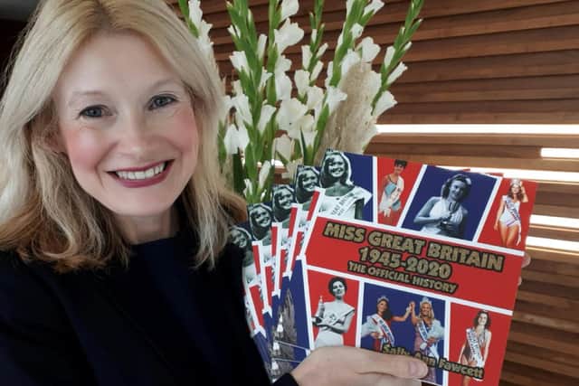 Sally Ann Fawcett with her book Miss Great Britain 1945-2020:The Official History which has been published.