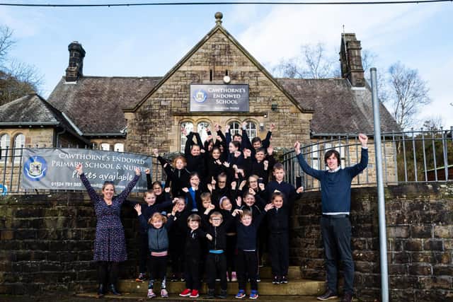 Some of the staff and pupils at Cawthorne's Endowed Primary School in Abbeystead. Photo by Kelvin Stuttard