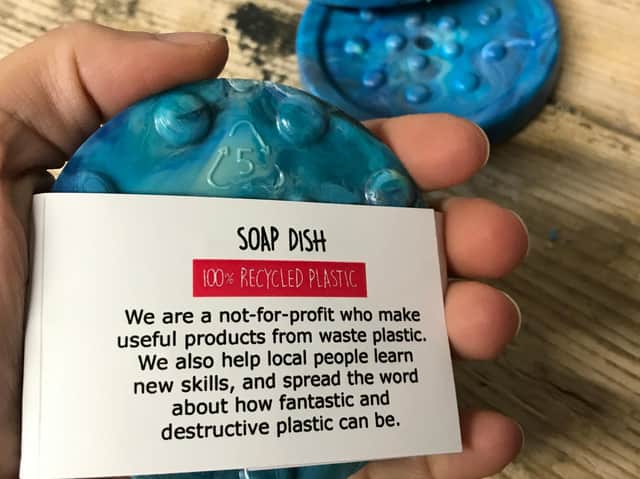 A soap dish made from shredded plastic.