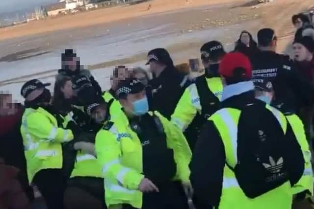 The chaotic scenes on Morecambe Promenade this afternoon (Saturday, November 21) after a woman was arrested at an anti-lockdown protest