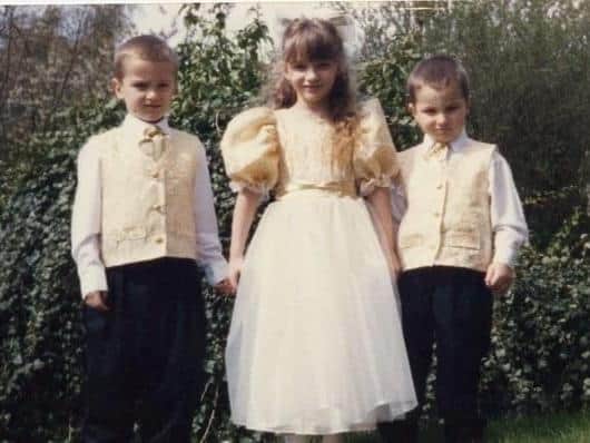 Charlotte Rumsey, from Preston, with brothers Callum, left, and Cameron in 2000, around the time the family were given the Harry Potter book. The first edition of Harry Potter and the Philosopher’s Stone is set to be auctioned in December 2020 and could fetch £50,000. Picture courtesy Hansons Auctioneers