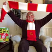 Cliff Crabtree celebrated his 90th birthday with a visit from the Morecambe FC team, who presented him with a signed card, scarf and mug.