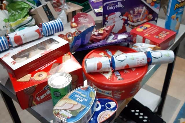 Examples of items in a foodbank Christmas box.
