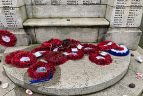 David Hodgson's photo shows the wreaths scattered across the pavement next to the Cenotaph.