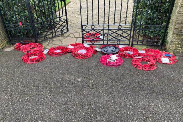 David Hodgson's photo shows the wreaths scattered across the pavement near the Cenotaph.