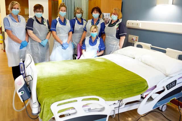 St John's Hospice nurses pictured with the trial cuddle bed earlier this year.