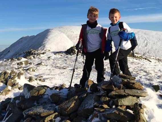 Walk number 4 in the snow. This was the boys' favourite walk of the whole challenge. Theo is on the left and Daniel on the right, wearing their hospice t-shirts.