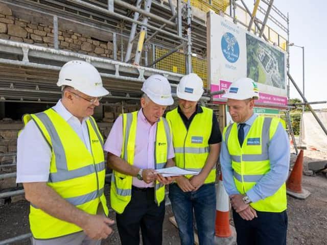 Wilson & Co Properties Ltd with The Guinness Partnership on site during the build process. Pictured is Wilson & Co Properties Ltd - Byron Wilson Director; Wilson & Co Properties Ltd - Jason Brown Site Manager; The Guinness Partnership - Paul Waton MBE Managing Director; The Guinness Partnership - Robert Murphy Clerk of works.