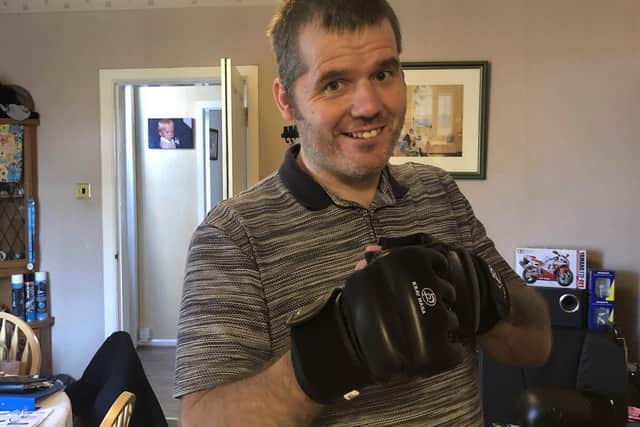 Rehabilitation work continues at home as Lee uses a boxing bag to build up his strength