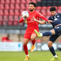 Nathaniel Knight-Percival (right) with Orient’s Lee Angol (photo: Getty Images)