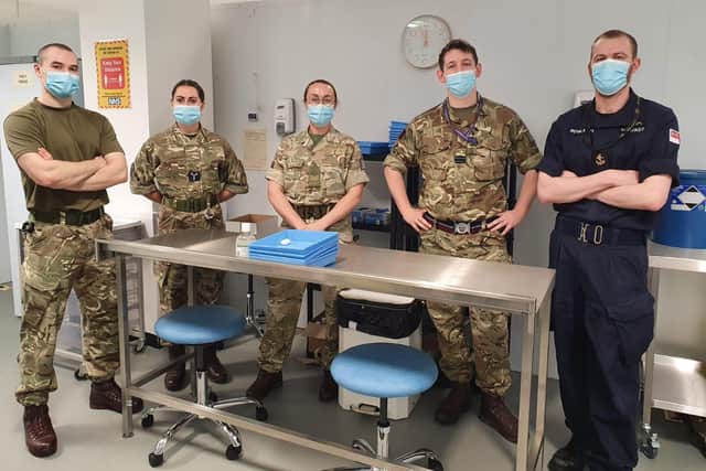 Members of the armed forces who are part of the team who will be drawing up and administering the Covid-19 vaccines at Lancaster Town Hall.