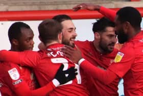 Morecambe's players defeated Colchester United at the weekend
