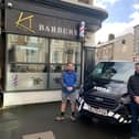 Kywan Mohammadi of K1 Barbers got some free help from electrician Jacob Hughes from Zebra Electrical.