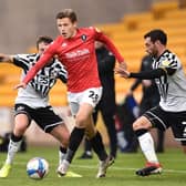 Salford City midfielder Alex Denny has joined Morecambe on loan