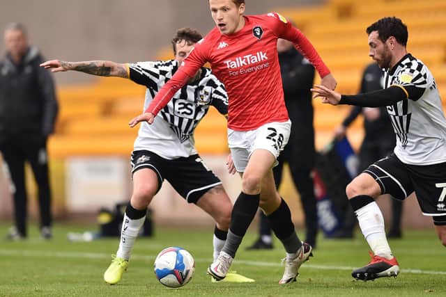 Salford City midfielder Alex Denny has joined Morecambe on loan