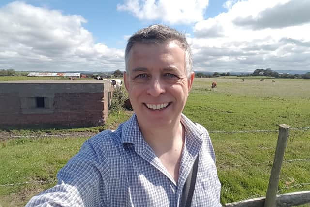 Paul Teague at Sunderland Point pillbox, a location in the books.
