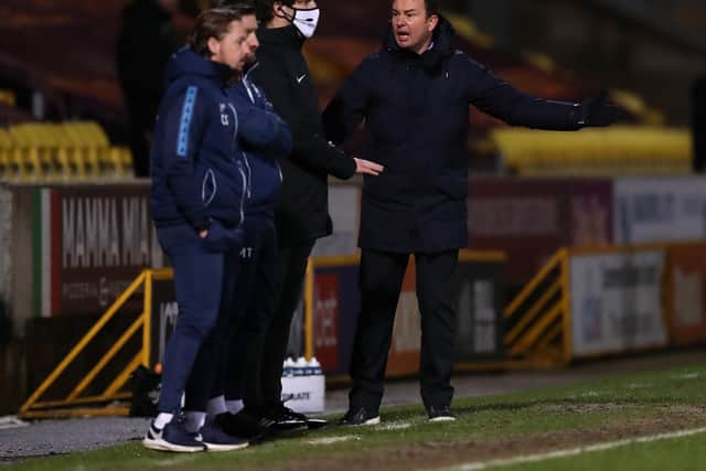 Morecambe manager Derek Adams has given hif players high praise