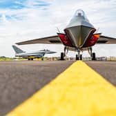BAE Systems' prototype of Tempest, the next generation of fighter jet, with the Typhoon in the background