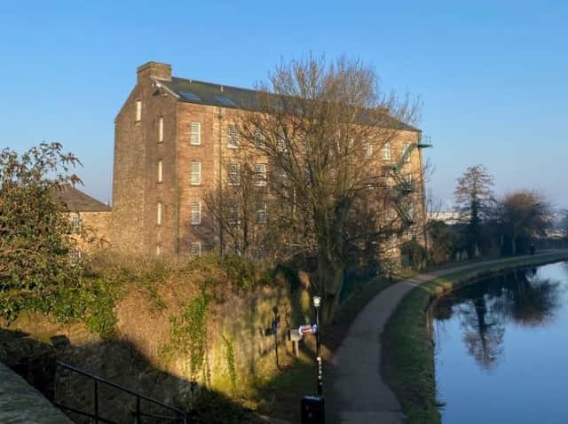 The former mill on Lancaster Canal which has been bought by Unipad.