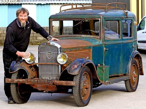 Andy Larton, racer and Peugeot enthusiast, with his 1932 Peugeot 201 barn-find car. Picture by Tony North