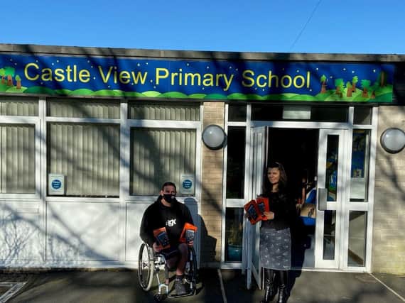 Shaun Gash delivers Amazon tablets to Castle View Primary School.