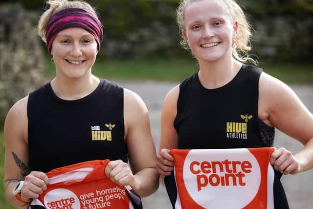 Beth Hoggarth from Hive Athletic and friend Lydia Fleming with their shirts for Centrepoint.