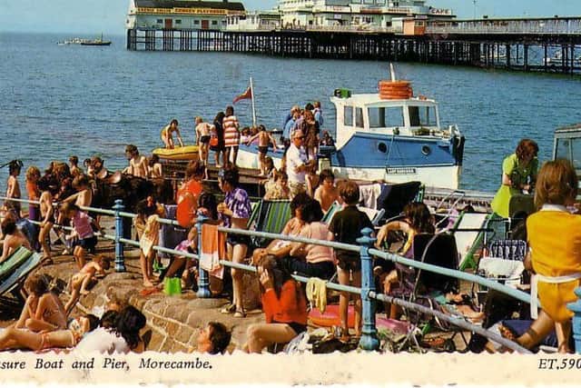 Pleasure boat for boat rides and the Central Pier in Morecambe.