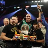 Tyson Fury (centre) after beating Deontay Wilder to win the WBC heavyweight crown