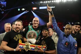 Tyson Fury (centre) after beating Deontay Wilder to win the WBC heavyweight crown