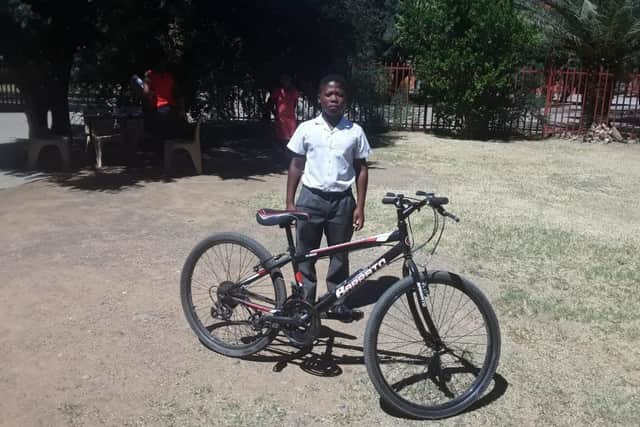 Thulo with his new bike.