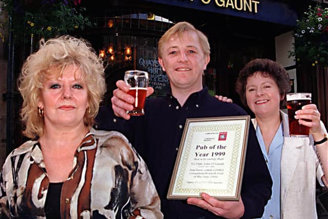 Licensee of Ye Olde John O'Gaunt, Lancaster, Steve Thorn with his wife Ula (left) celebrate being nominated by the Lunesdale Branch of CAMRA for the Pub of the Year Award, with chair of the branch, Jenny Greenhalgh.